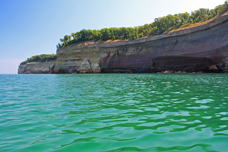 kayaking along picured rocks