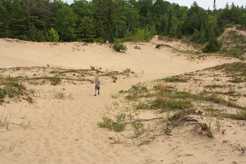 hiking down to the beach at leelanau state park