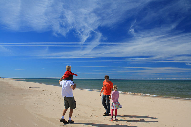 walking the beach by big sable point