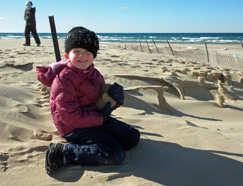 checking out the sand sculptures on the beach