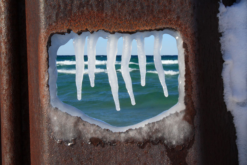 ice on the breakwall big sable point