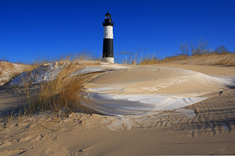 snow and sand drifts on the way to the big sable point lighthouse