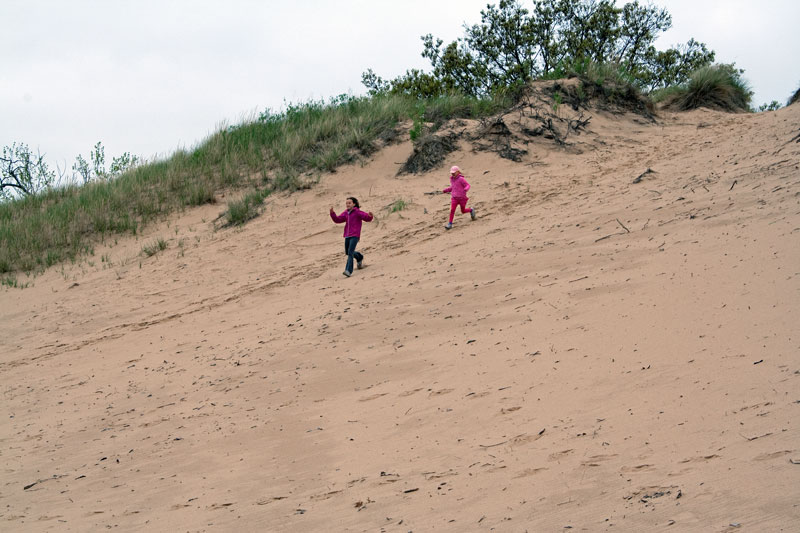 running down the dune muskegon lake