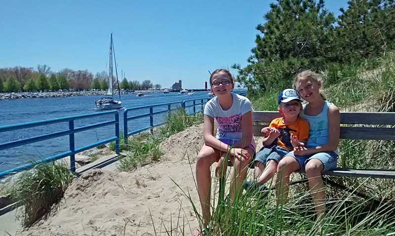 watching boats in the muskegon channel