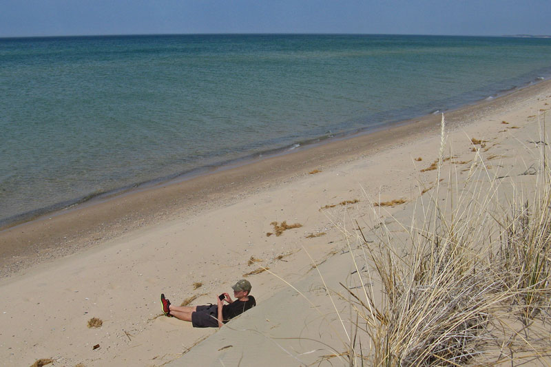 relaxing on the beach after backpacking to nordhouse dunes