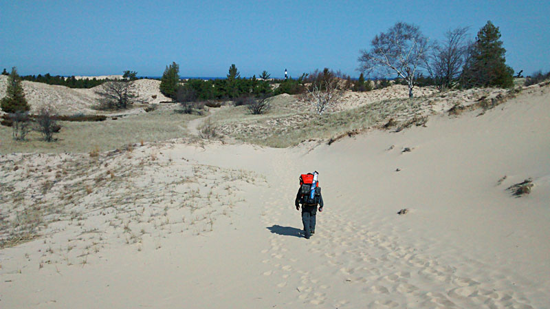 the view of big sable point lighthouse on the lighthouse trail 