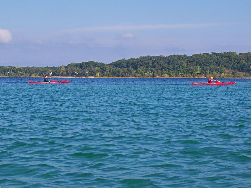 paddling across grand traveers bay