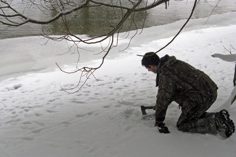 water hole in the ice on the pine river