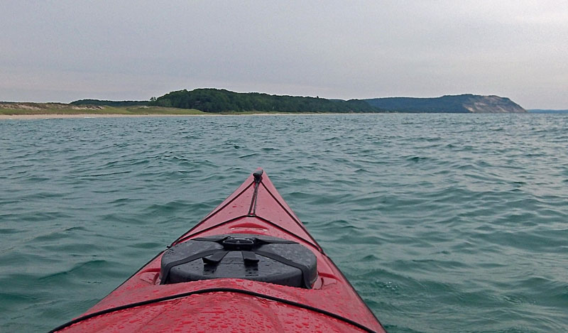 paddling back to north bar lake with empire bluffs on the horizon