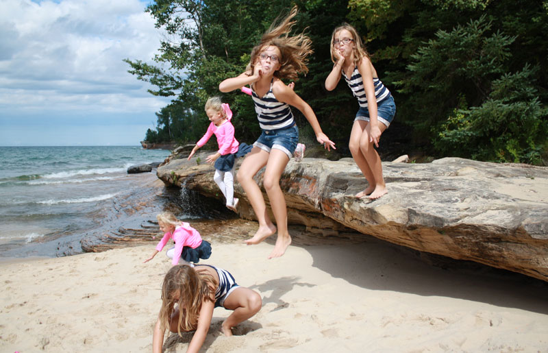 jumping off rock at miners beach