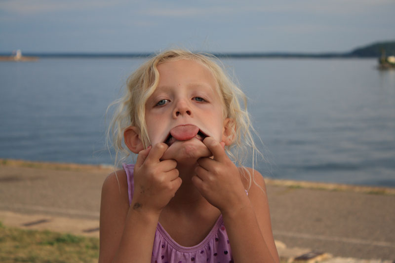 goofy face by marquette harbor