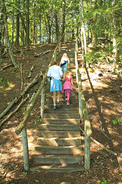 climbing the stairs to the higher cliffs over lake superior