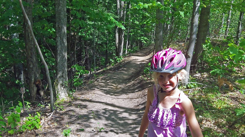 reese riding the tag-aling on the grom trail