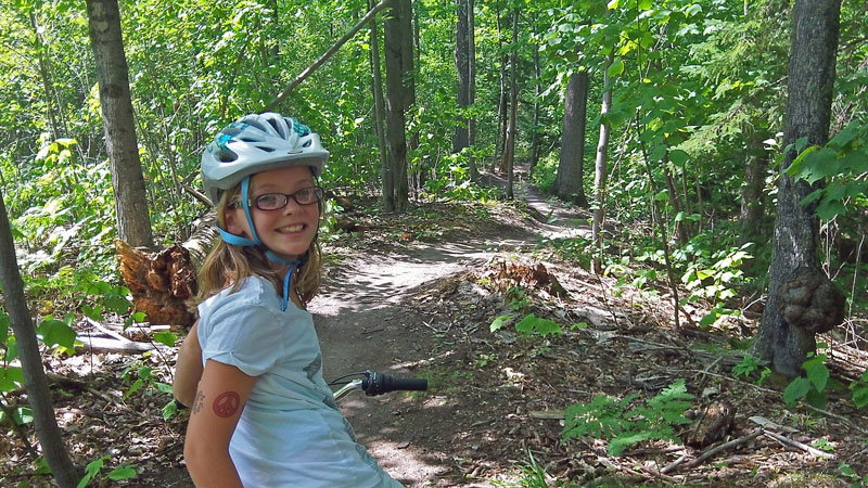 regan on the marquette kids mountain bike trail