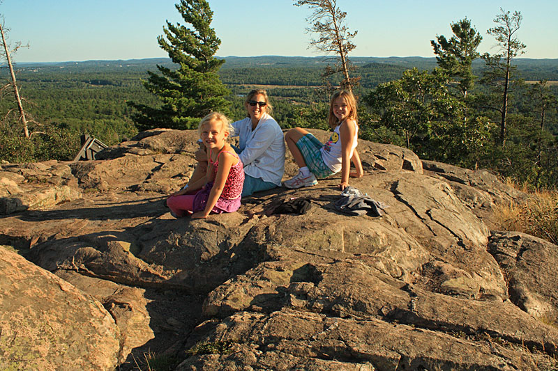 resting on the rocks at the top of sugarloaf mountain