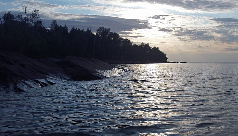 paddling into the setting sun in porcupine mountians state park