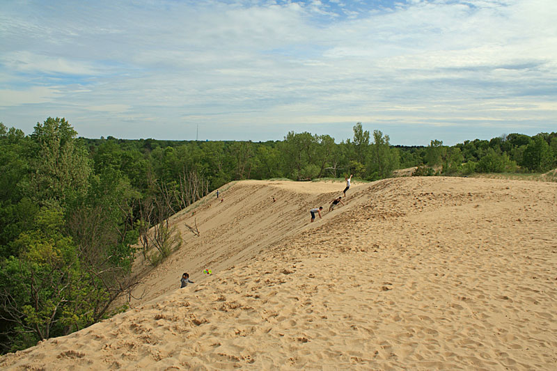 jumping down the backside of pikes peak at warren dunes state park