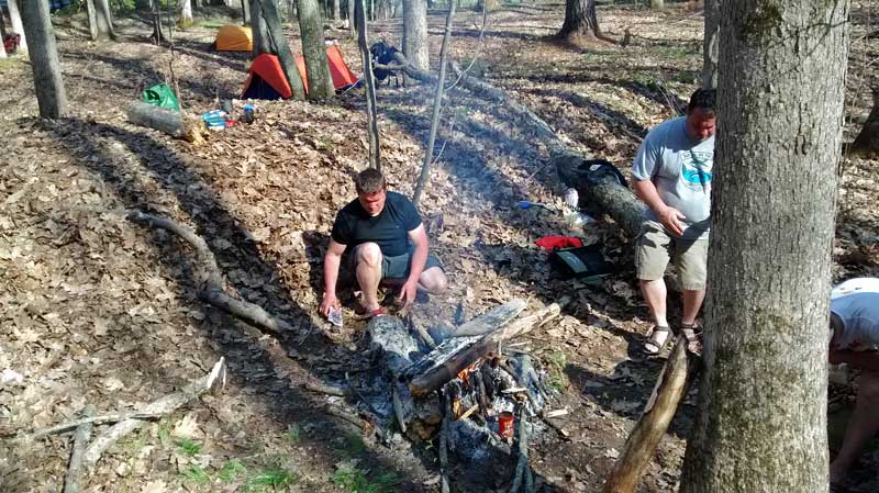 cooking dinner by the campfire