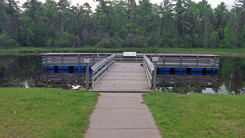 the fishing pond at young state park boyne city