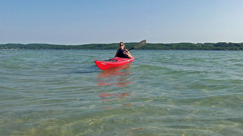 kayaking in lake charlevoix young state park