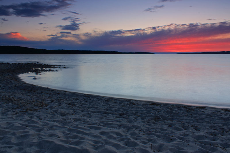 sunset over lake charlevoix from young state park