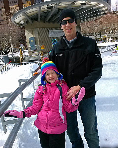 taking a skating break by the hand rail