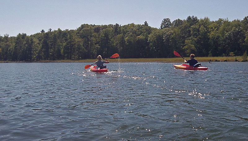 paddling along the shore of hamlin lake