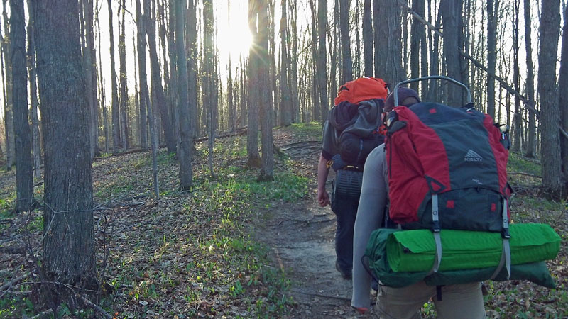 heading down the trail into the morning sun